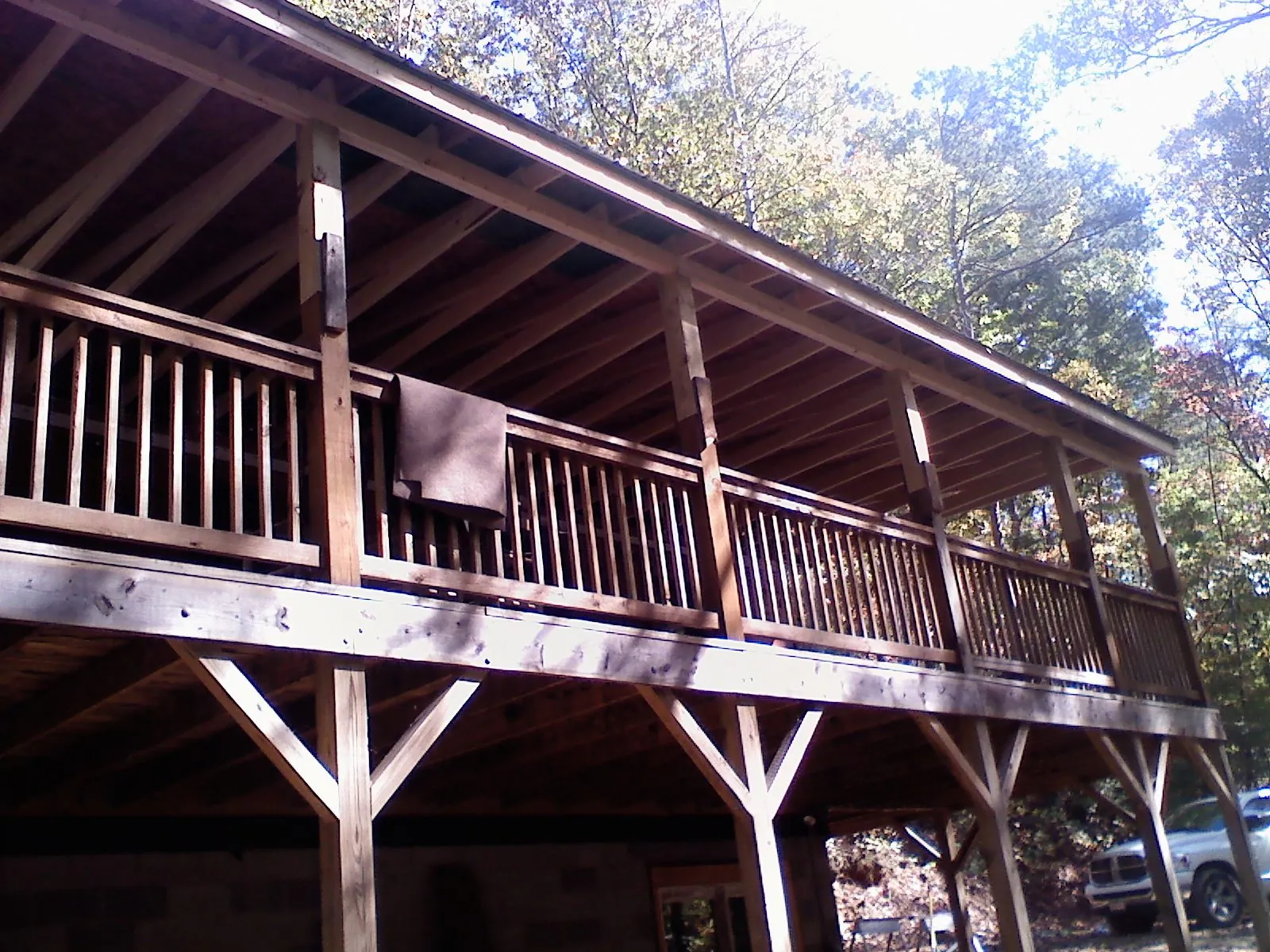 Timber framing under a new elevated porch and deck — Roof Leak Repair in Only by Roofing Brothers